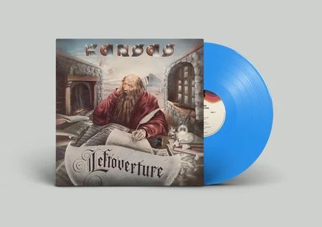 „Kansas Leftoverture“. Illustration von einem alten Mann in rotem Gewand, der an einem Schreibtisch sitzt. Blaue Schallplatte.