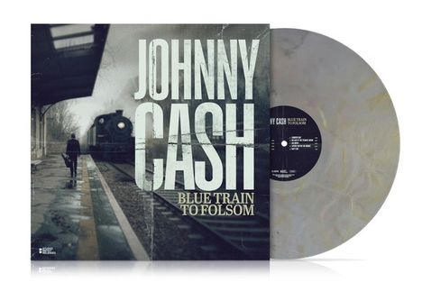 Text: Johnny Cash, Blue Train to Folsom. Cover zeigt einen Mann auf einem Bahnsteig mit einem einfahrenden Zug. Schallplatte daneben.