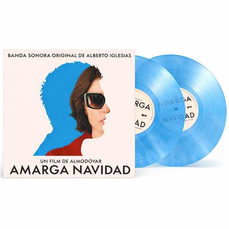 Cover der Filmmusik "Amarga Navidad" von Alberto Iglesias, blaue Schallplatten, Profil einer Frau mit Sonnenbrille.