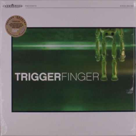 Text: "TRIGGER FINGER". Oben: zwei Zeichnungen, links ein Siegel. Grünlich-schwarz, zeigt Beine eines Roboters.