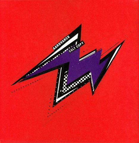 Text: "AARDVARCK CULT COPY". Illustration eines violetten Zickzack-Blitzes auf rotem Hintergrund.