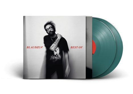Text: "BLAUDZUN BEST OF". Verschwommener Mann mit Brille. Zwei grüne Vinyl-Schallplatten im Hintergrund.