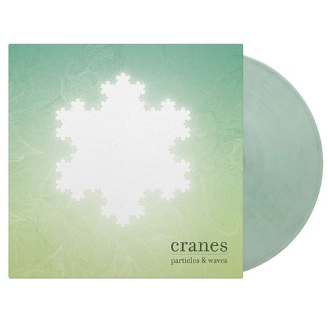 „cranes particles & waves“ auf grünem Hintergrund mit weißem Fraktalmuster. Transparente, grüne Vinyl-Schallplatte.