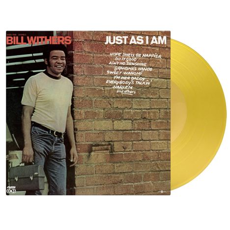 Albumcover "Just As I Am" von Bill Withers, gelbe Vinyl-Platte links, Backsteinmauer im Hintergrund.