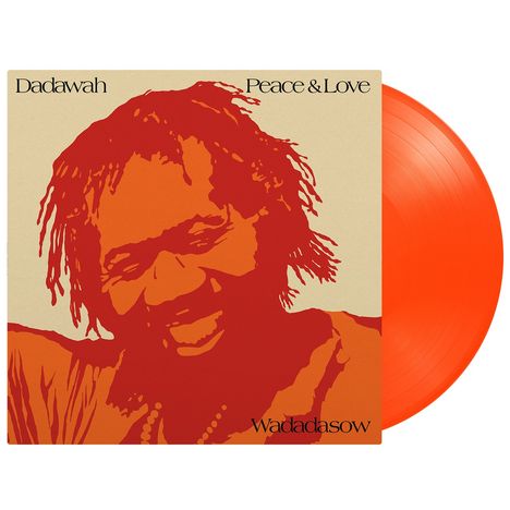"Dadawah", "Peace & Love", "Wadadasow" in schwarzer Schrift. Illustration eines lächelnden Gesichts in Rot-Orange. Orangefarbene Vinyl.