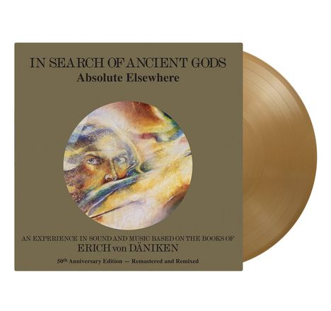 Albumcover "IN SEARCH OF ANCIENT GODS", Artwork zeigt ein mystisches Gesicht, goldene Schallplatte beigefügt.