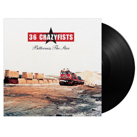 Text: "36 CRAZYFISTS" und "Bitterness The Star". Ein rotes Fahrzeug vor einem Erdwall und gestapelten Platten.