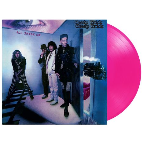 „All Shook Up“ und „Cheap Trick“ Schriftzug. Vier Männer in einem surrealen Raum, großes Auge und rosa Platte.
