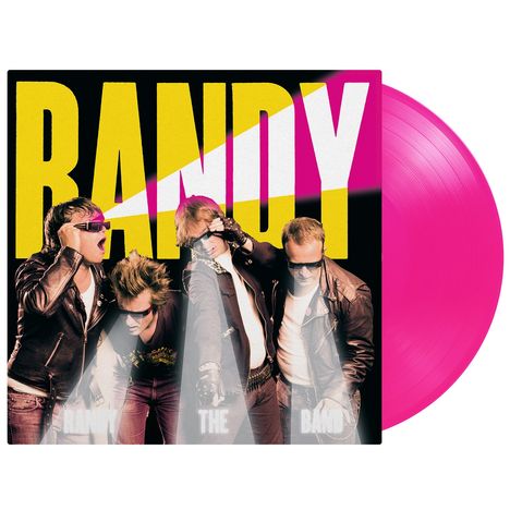 Text: "RANDY" groß in Gelb und Weiß, "THE BAND" unten. Vier Männer in Lederjacken mit Sonnenbrillen. Pinke Vinyl-Schallplatte.
