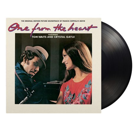 Schrift: "One from the heart", “featuring Tom Waits and Crystal Gayle”. Ein Mann mit Hut sieht auf eine lächelnde Frau.