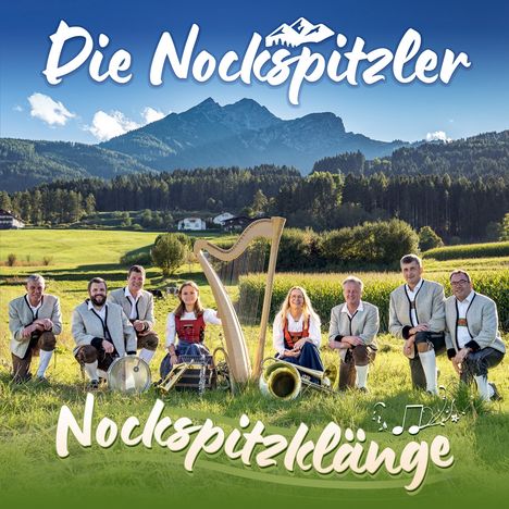 "Die Nockspitzler" oben, "Nockspitzklänge" unten. Eine Gruppe in Tracht mit Musikinstrumenten vor alpiner Landschaft.