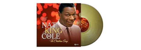 "Nat King Cole – The Christmas Song." Ein lächelnder Mann in Anzug auf rotem Hintergrund und eine goldene Schallplatte.