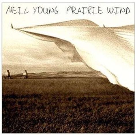 Text: "Neil Young Prairie Wind." Sepia-Tonaufnahme mit einem großen, wehenden Tuch über einer offenen Prärie.