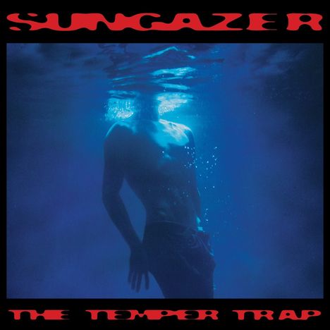 "SUNGAZER", "THE TEMPER TRAP" in roter Schrift. Unterwasser-Silhouette einer Person in Blau.