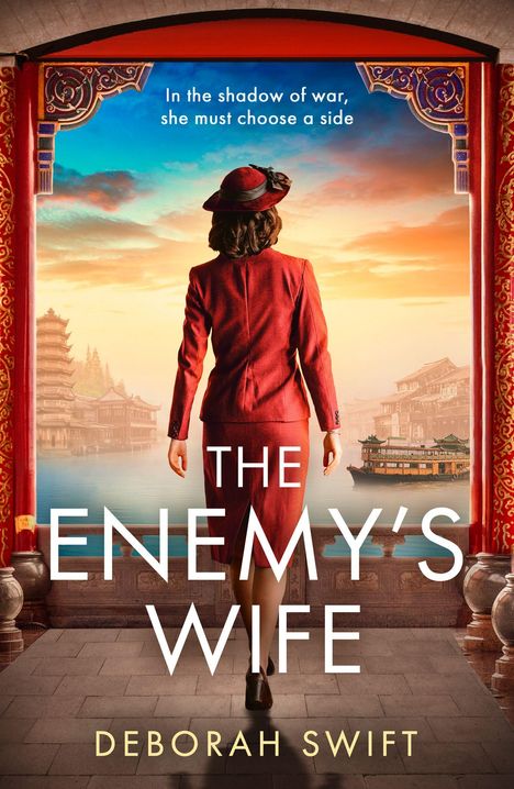 Text: "In the shadow of war, she must choose a side. THE ENEMY’S WIFE. DEBORAH SWIFT." Frau in rotem Anzug, asiatische Szenerie.