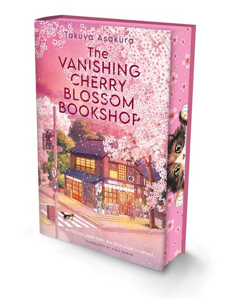 „The Vanishing Cherry Blossom Bookshop“, rosa Cover mit Kirschblüten und einer Buchhandlung in der Abenddämmerung.