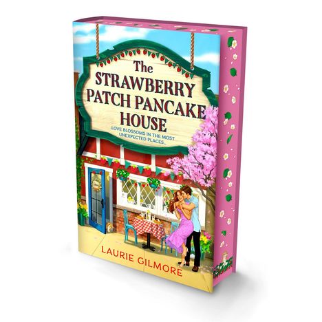 "The Strawberry Patch Pancake House." Love blossoms unerwartet. Ein Paar umarmt sich vor einem gemütlichen Café in frühlingshafter Szene.