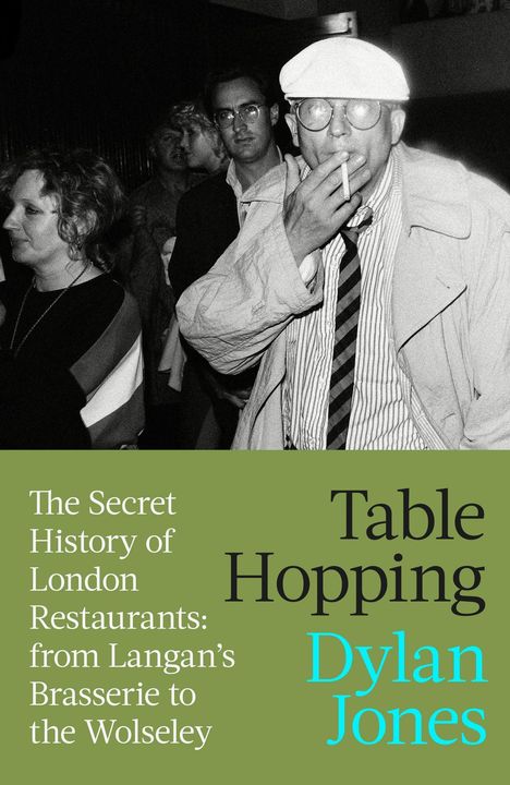 "The Secret History of London Restaurants: from Langan’s Brasserie to the Wolseley. Table Hopping. Dylan Jones." Schwarz-Weiß-Foto einer Clubszene mit mehreren Personen, eine raucht.