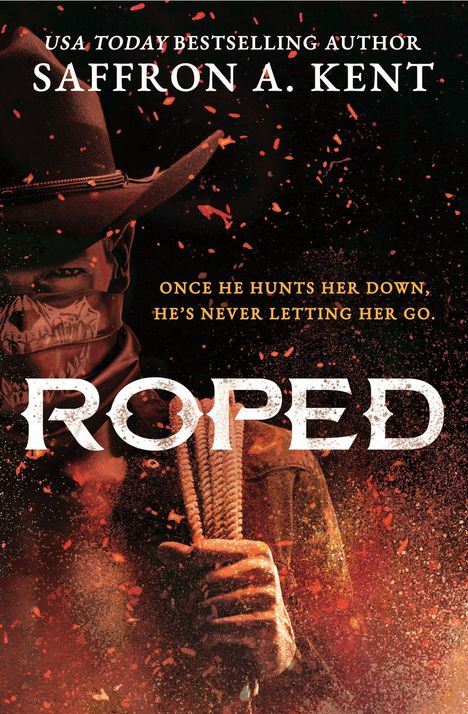 Text: USA TODAY BESTSELLING AUTHOR, SAFFRON A. KENT, ONCE HE HUNTS HER DOWN, HE'S NEVER LETTING HER GO, ROPED.  
Ein Cowboy mit Hut, Bandana-Gesichtstuch und Seil in der Hand. Herausforderungen und Dramatik spürbar.