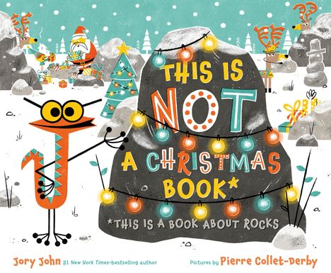 „THIS IS NOT A CHRISTMAS BOOK“ steht auf einem Felsen. Cartoon-Reptil mit Kette aus bunten Lichtern, winterliche Szene.