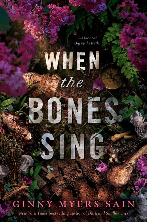 „When the Bones Sing“. „Find the dead. Dig up the truth.“ Blumen, Kompass, Knochen und Erde sind sichtbar.