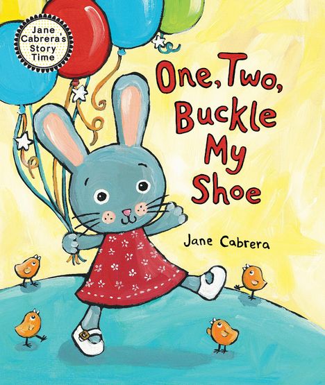 Text: „One, Two, Buckle My Shoe“, „Jane Cabrera“. Illustration: Hase mit Ballons, Vögel auf einem Hügel.