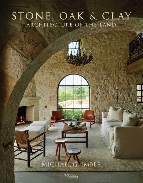 TEXT: "STONE, OAK & CLAY: ARCHITECTURE OF THE LAND", "MICHAEL G. IMBER". Elegantes Wohnzimmer aus Stein mit großem Fenster.