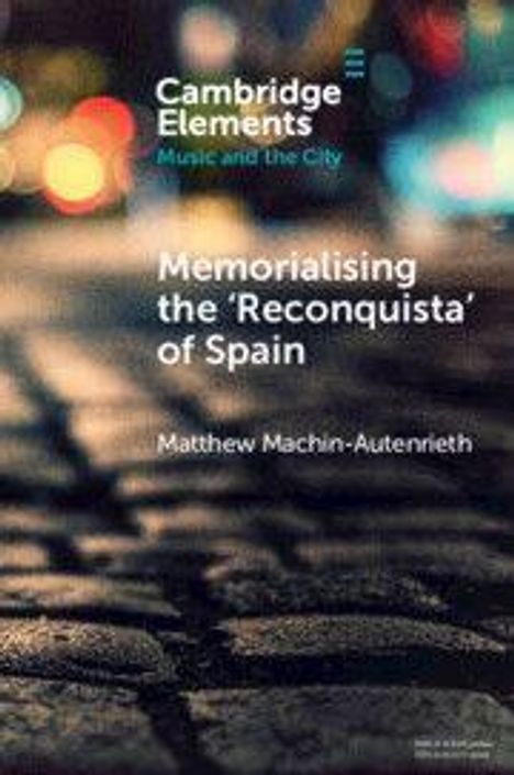 Titel: "Memorialising the 'Reconquista' of Spain". Autor: Matthew Machin-Autenrieth. Unscharfe, nächtliche Stadtansicht.