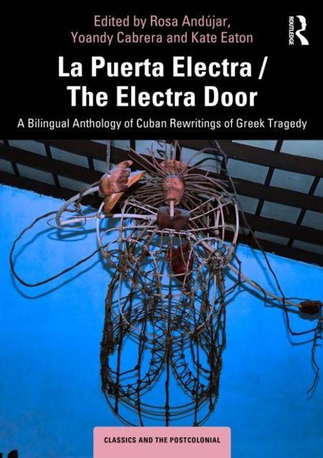 "La Puerta Electra / The Electra Door" ist der Titel, darunter ein kunstvolles Drahtgebilde an einer Wand.