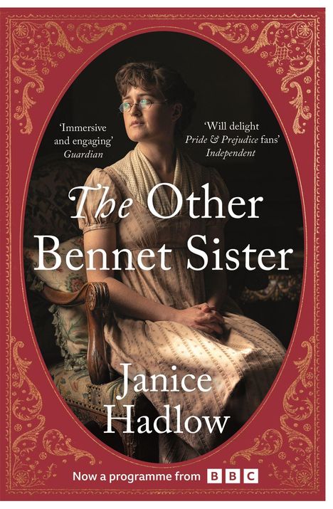 „The Other Bennet Sister“ von Janice Hadlow. Frau in blauem Kleid mit rotem Buch, BBC-Logo unten.