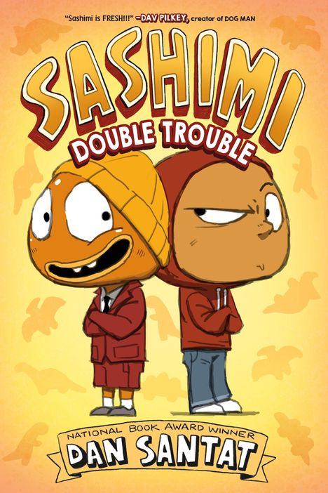 „Sashimi: Double Trouble“ oben, „Dan Santat“ unten. Zwei Comicfiguren in roten Outfits lächeln skeptisch.