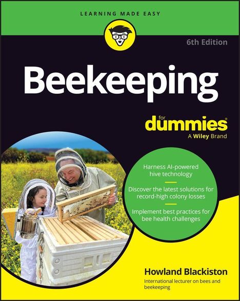 „Beekeeping for dummies“ auf Buchcover. Zwei Imker:innen in Schutzkleidung vor blühendem Feld neben Bienenstock.
