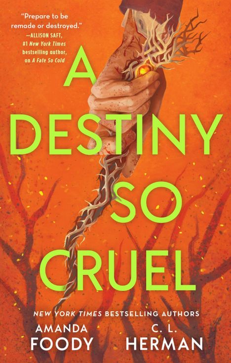„A Destiny So Cruel“ in hellen, großen Buchstaben. Eine Hand hält einen leuchtenden, verwurzelten Stab auf orangenem Hintergrund.