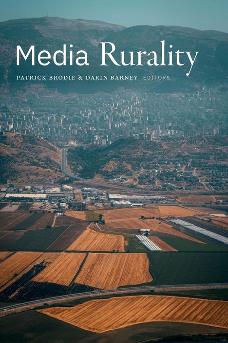 Text: "Media Rurality" und "Patrick Brodie & Darin Barney Editors". Unten sind Felder, oben eine Stadt mit Hügeln im Hintergrund.