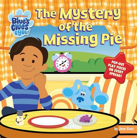"The Mystery of the Missing Pie" und "Pop-out play pieces on every spread!". Ein Junge, ein blauer Hund, ein Tisch mit Teller.