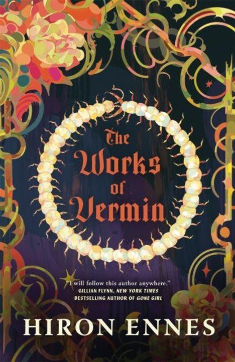 "The Works of Vermin" von Hiron Ennes. Runder Tausendfüßler umrahmt den Titel, bunte, verschlungene Formen im Hintergrund.