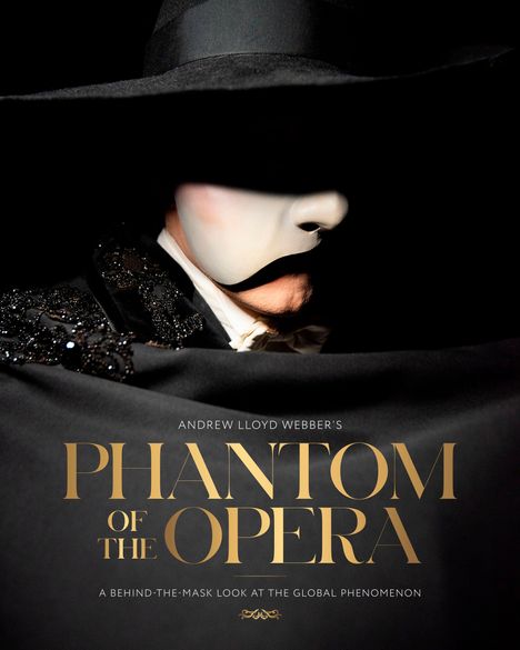 ANDREW LLOYD WEBBER'S PHANTOM OF THE OPERA: Eine Person mit Maske und Hut im Schatten, elegant gekleidet.