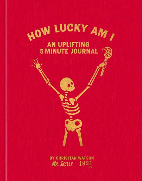 "HOW LUCKY AM I" und "AN UPLIFTING 5 MINUTE JOURNAL" oben, unten "BY CHRISTIAN WATSON, MR. SKELLY". Goldenes Skelett auf rotem Hintergrund.