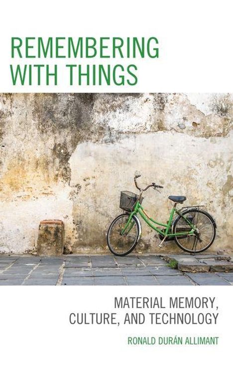 „Remembering with Things: Material Memory, Culture, and Technology“ von Ronald Durán Allimant, grünes Fahrrad an alter Wand.