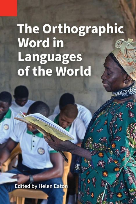 "The Orthographic Word in Languages of the World" und "Edited by Helen Eaton". Eine Frau liest einer Gruppe vor.