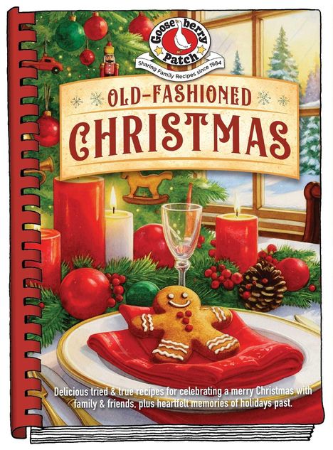 „Old-Fashioned Christmas“; roter Einband. Weihnachtsbaum, Keksmann, Kerzen. Fenster mit Schnee. Festlich gedeckter Tisch.