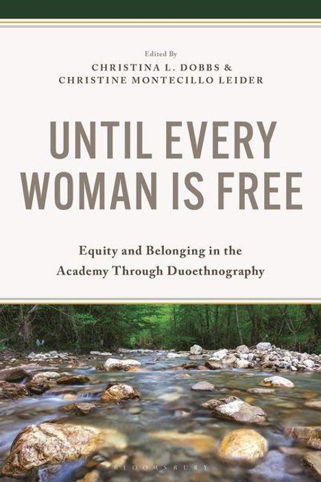 "UNTIL EVERY WOMAN IS FREE" ist der Haupttext. Darunter fließt ein klarer Bach durch einen bewaldeten Bereich.