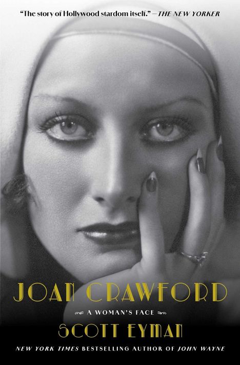 "Joan Crawford: A Woman's Face" von Scott Eyman. Schwarz-weiß Porträt mit elegantem Make-up und eindringlichem Blick.