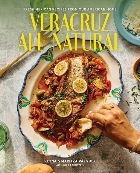 „Veracruz All Natural“ steht im Mittelpunkt, darunter ein buntes Tellergericht mit Fisch und Limettenscheiben.