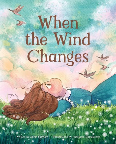 "When the Wind Changes". Illustration eines Mädchens, das im Gras liegt, während Vögel am Himmel fliegen.