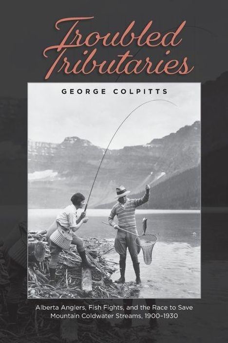 "Troubled Tributaries" von George Colpitts. Zwei Männer angeln an einem See vor einer Bergkulisse.