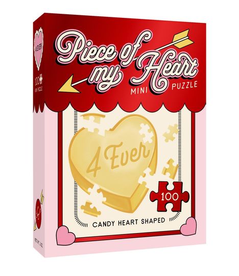 „Piece of my Heart“, „4 Ever“, „100“, „Candy Heart Shaped“. Eine herzförmige Puzzle-Schachtel in Rot und Rosa.