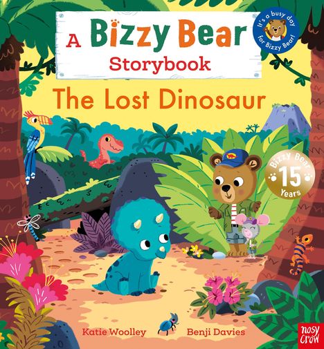 "Bizzy Bear Storybook: The Lost Dinosaur". Ein blauer Dinosaurier, ein Bär und eine Maus im Dschungel. Bunte Pflanzen und Tiere.