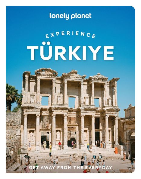 lonely planet, EXPERIENCE TÜRKİYE, GET AWAY FROM THE EVERYDAY. Antike Ruine mit Touristen vor klar blauem Himmel.