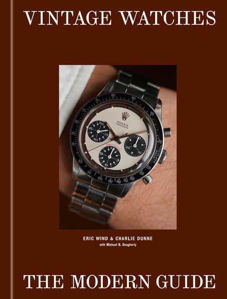 "VINTAGE WATCHES" oben, "THE MODERN GUIDE" unten. Mittig eine klassische Uhr am Handgelenk.
